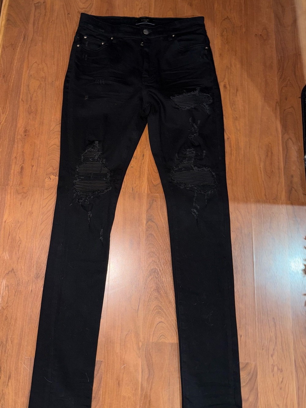AMIRI MX 1 Black Ripped Skinny Jeans
